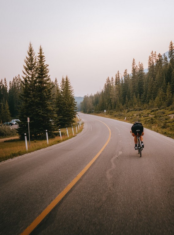 downhill road bike with carbon wheels at full speed